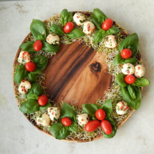 Tomatoes on sprouts wreath